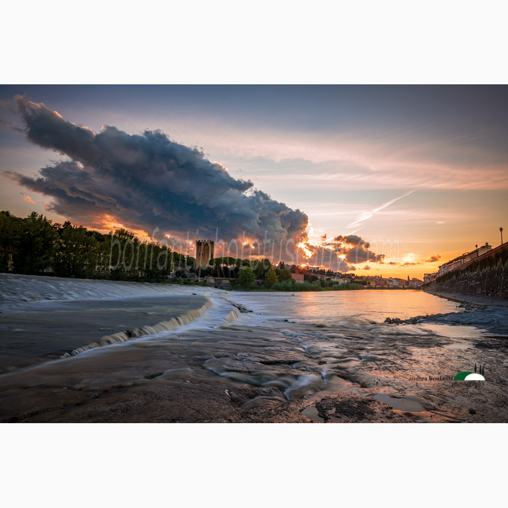 cloudy sunset on the river arno at the san niccolò weir.jpg