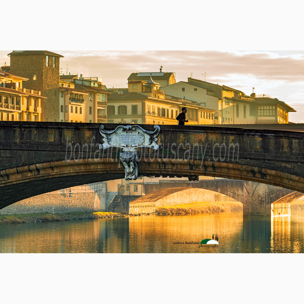 an early riser runner on the santa trinita bridge in florence.jpg