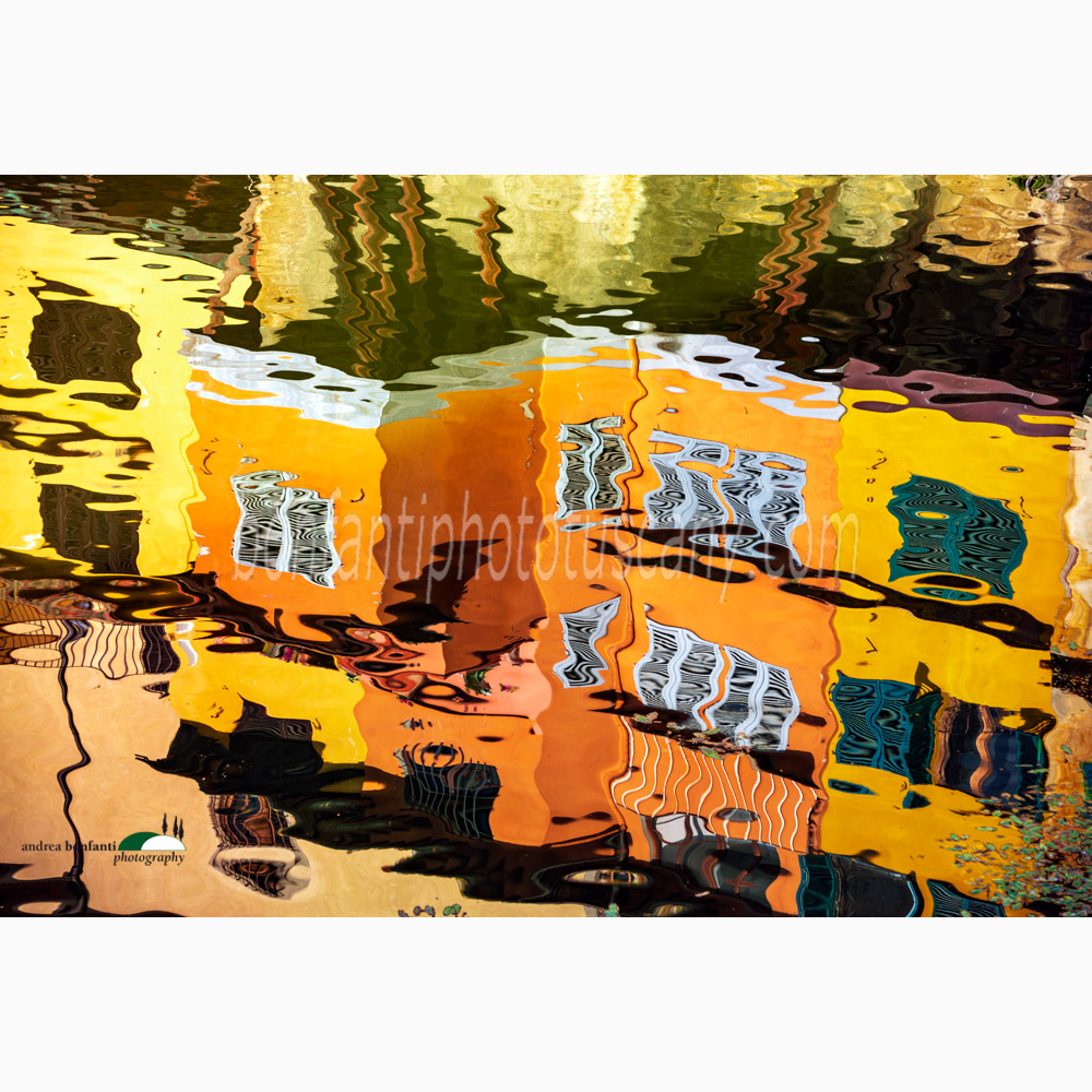 abstract reflection of ponte vecchio in florence.jpg