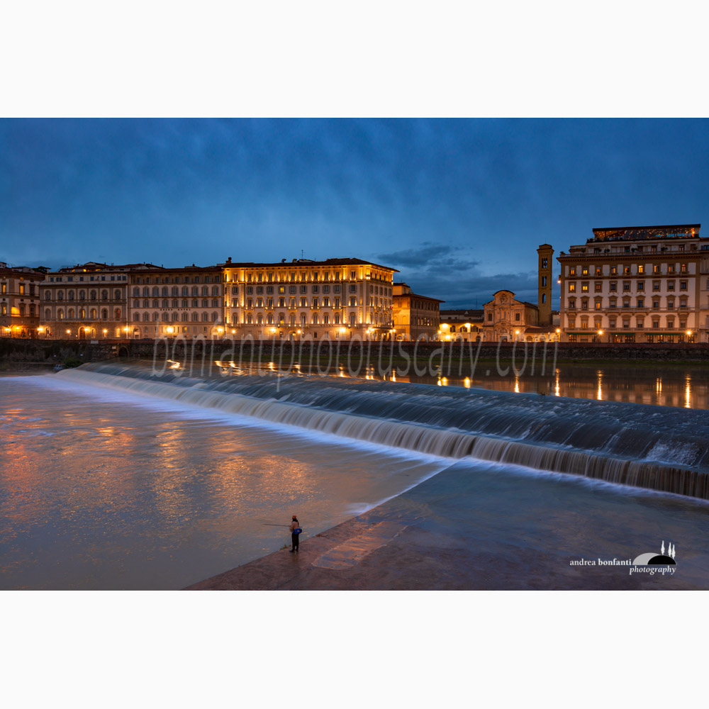 lonely fisherman in florence.jpg