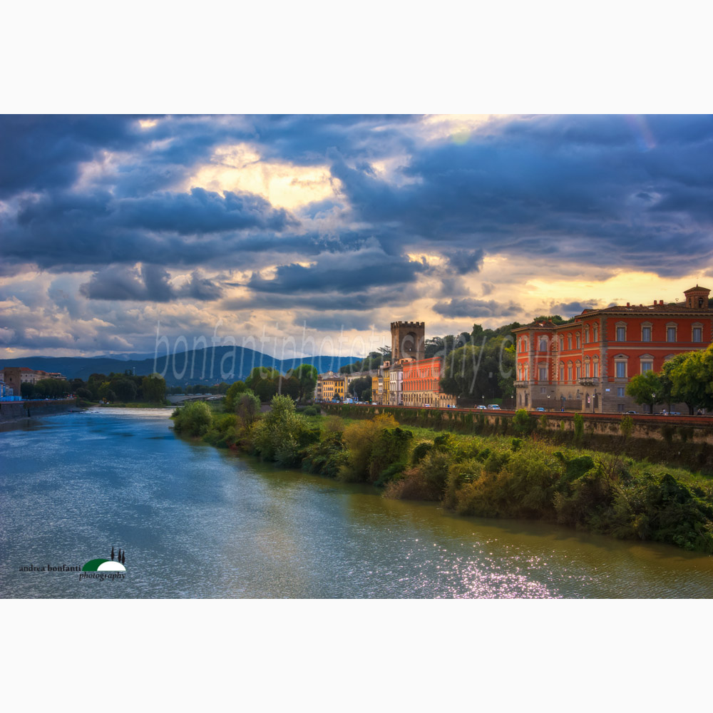 a stormy view of the river arno in florence from ponte alle grazie.jpg