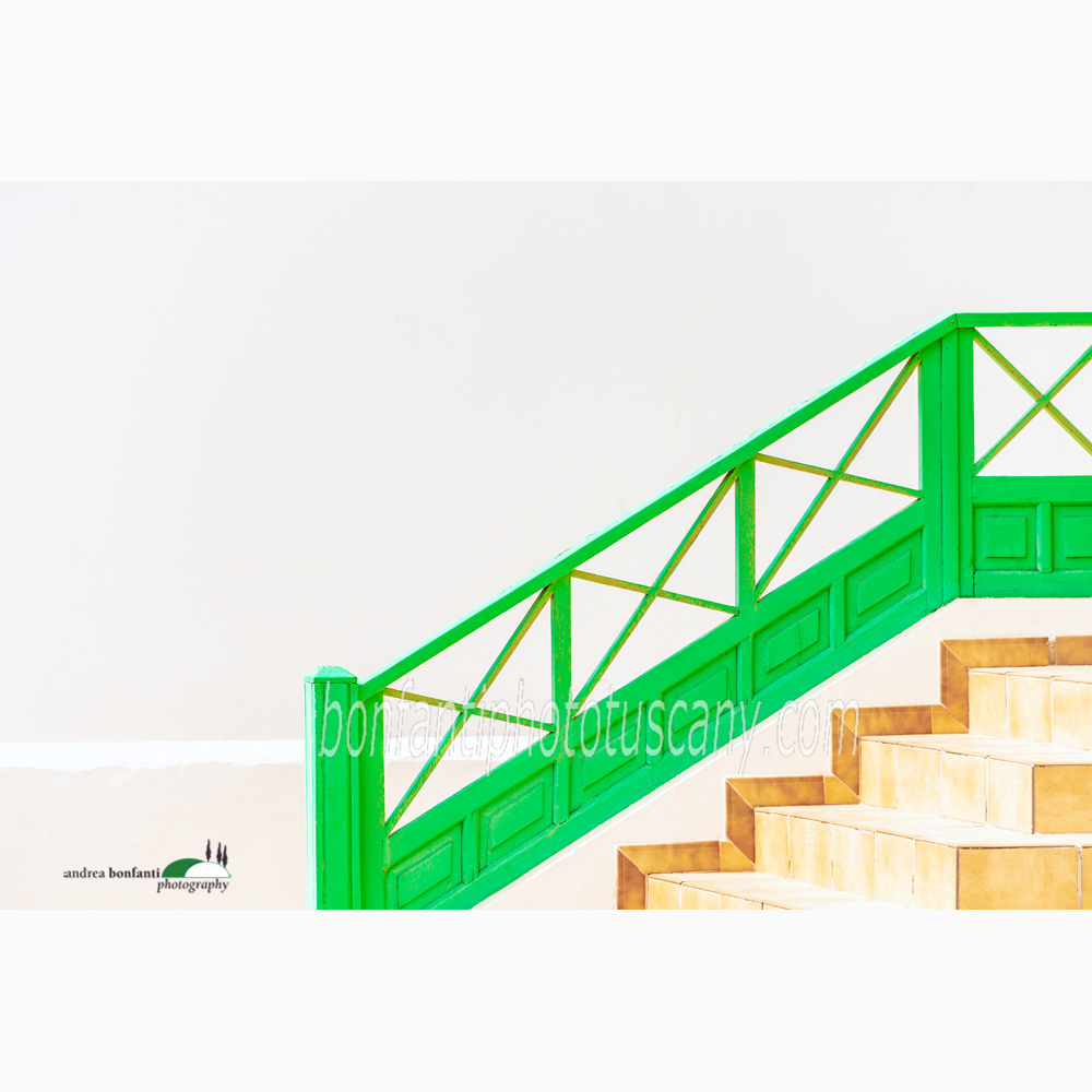 a house entrance with a green handrail in Playa Honda.jpg