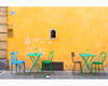a wine window and colorful tables in via santo spirito.jpg