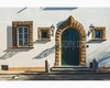 il portale d’ingresso di villa sant’agnese in via san leonardo con ombre che si allungano sul muro nel tardo pomeriggio.jpg