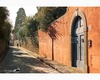 un romantico controluce invernale della via san leonardo col portale di villa lauder in primo piano.jpg